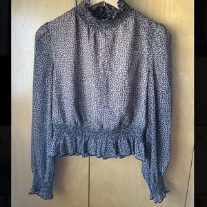 Cheetah printed long sleeve blouse with cinched waist